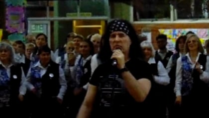 Watch: Original AC/DC Frontman DAVE EVANS Sings 'Highway To Hell' With Argentine Choir