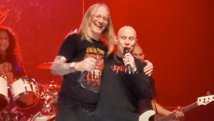 Watch: JOHN BUSH Rejoins ARMORED SAINT On Stage After Sitting Out Shows Due To Respiratory Infection