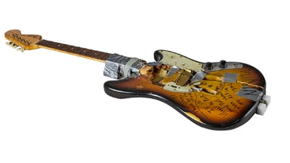 KURT COBAIN's 1989 Stage-Played, Smashed And Signed Guitar Used On NIRVANA's First U.S. Tour Sells For $486,400