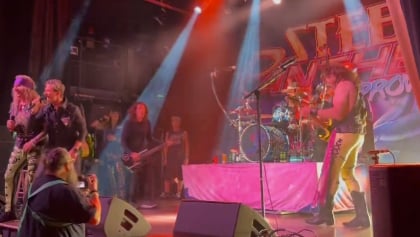 Watch: STEEL PANTHER Joined By ANTHRAX's FRANK BELLO And HOLY MOTHER's MIKE TIRELLI For Cover Of WHITESNAKE's 'Slide It In'